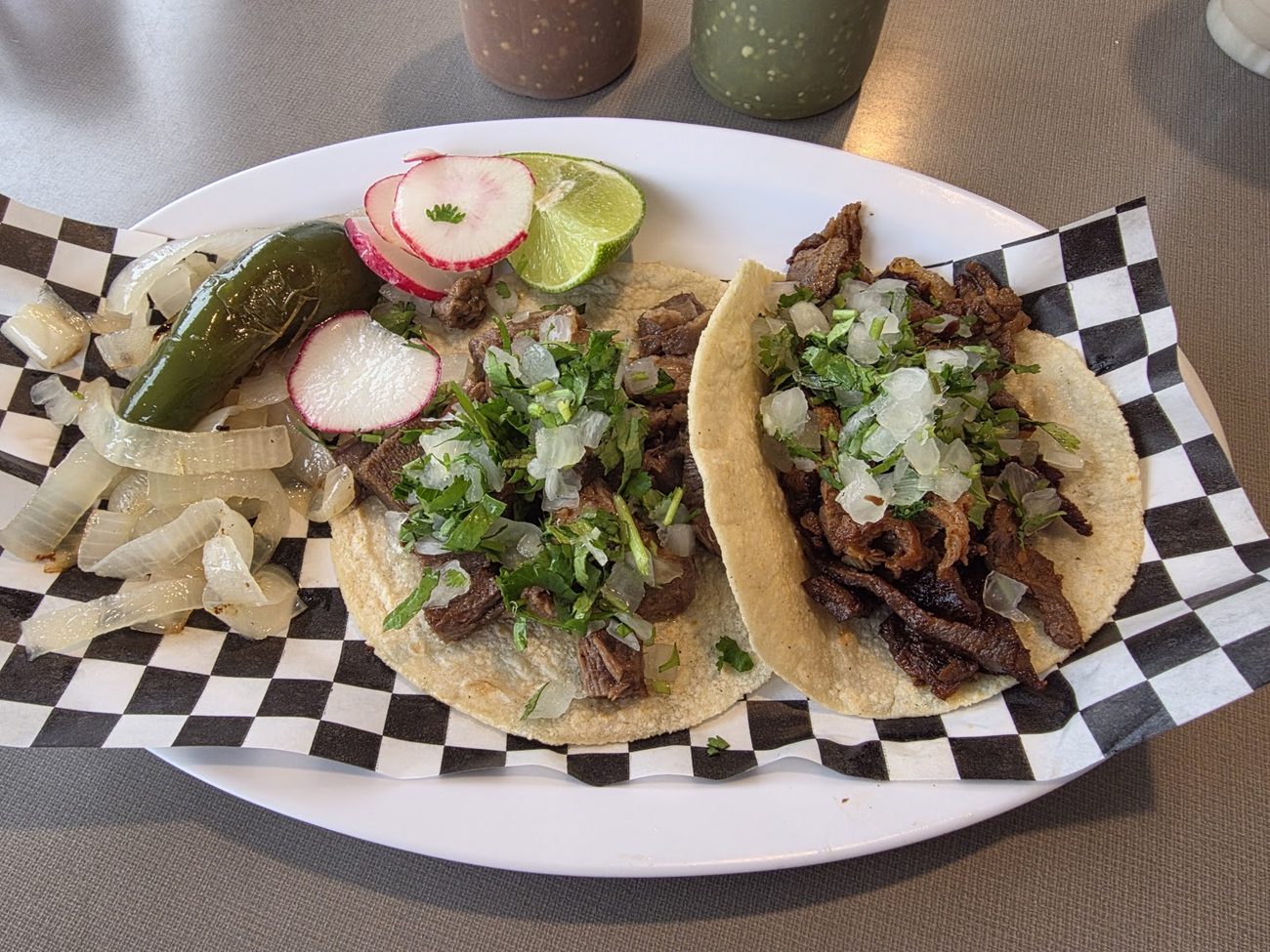 Plate of birria tacos